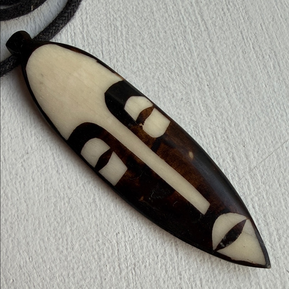 African Bone Face Mask Pendant Necklace on adjustable cord - Picture 3 of 8